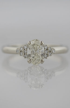 Oval Diamond with Diamond Clusters in 14K White Gold